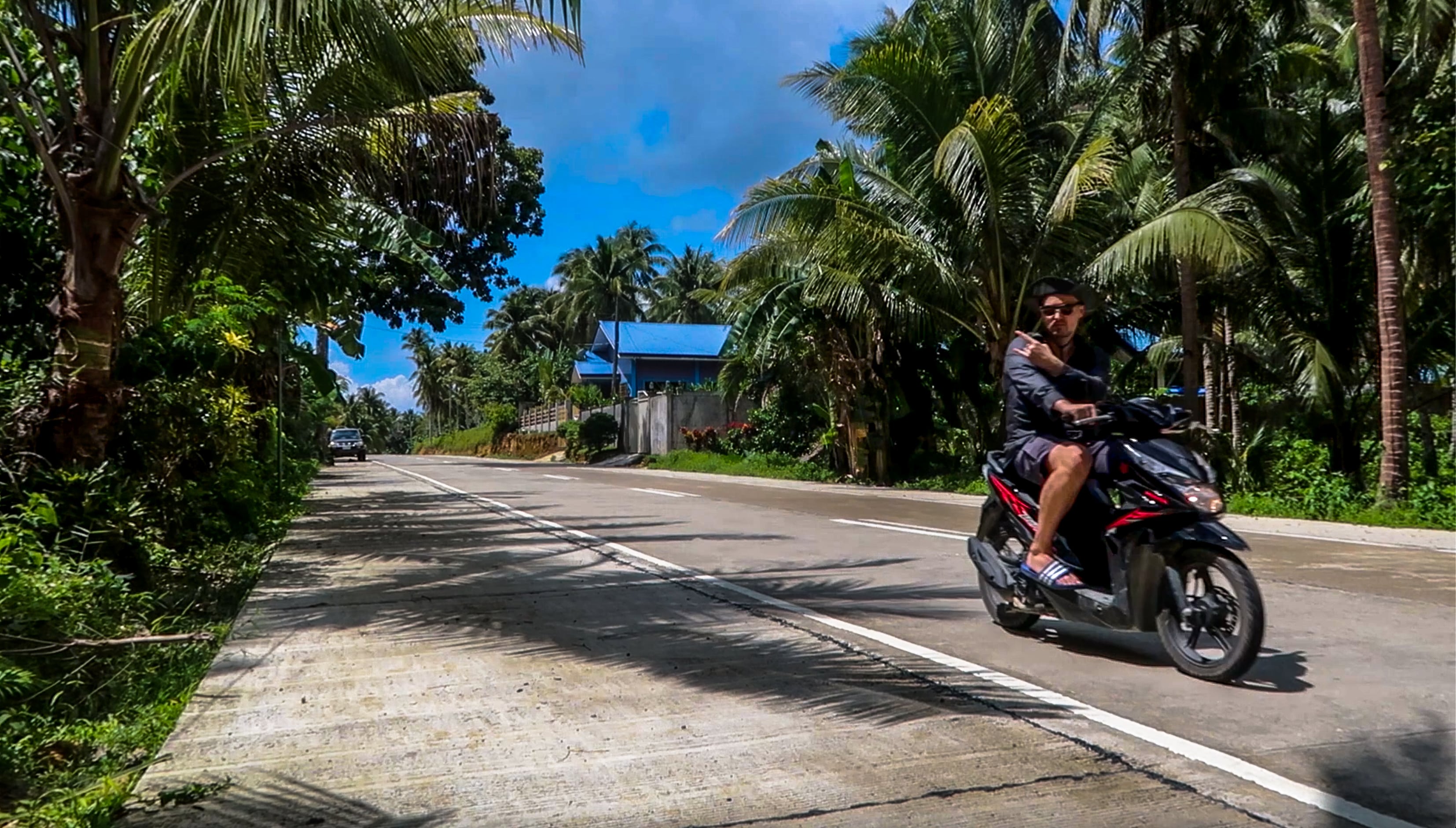 lennythroughparadise on scooter riding on siargao island in the philippines